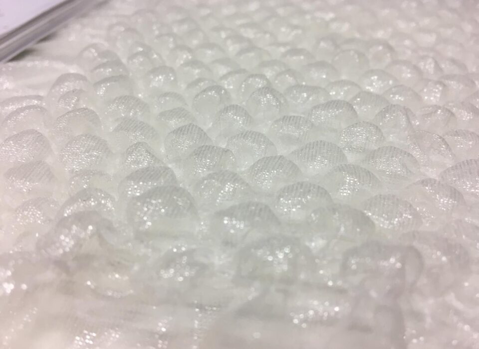 Punto smock effetto bolle. Ricamo elastico tipo Pluriball