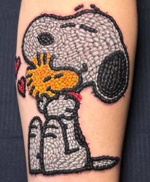 foto dettaglio tatuaggio effetto ricamo